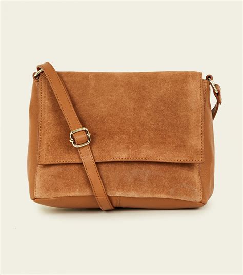 tan suede crossbody bag.